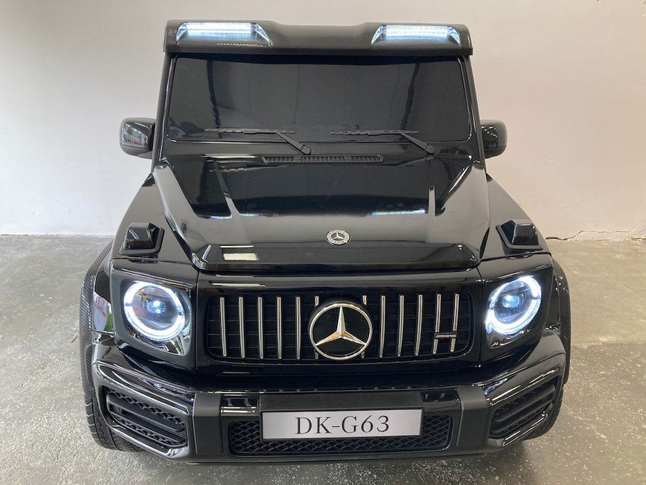 Mercedes G63 XL AMG Deluxe Kinderauto 24V 4WD zwart metallic twee persoons - Trapautodealer
