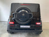 Mercedes G63 XL AMG Deluxe Kinderauto 24V 4WD zwart metallic twee persoons - Trapautodealer